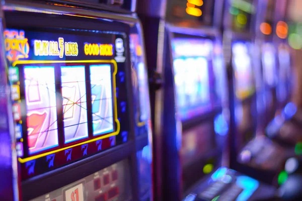 Live casino dealer at multi-camera table